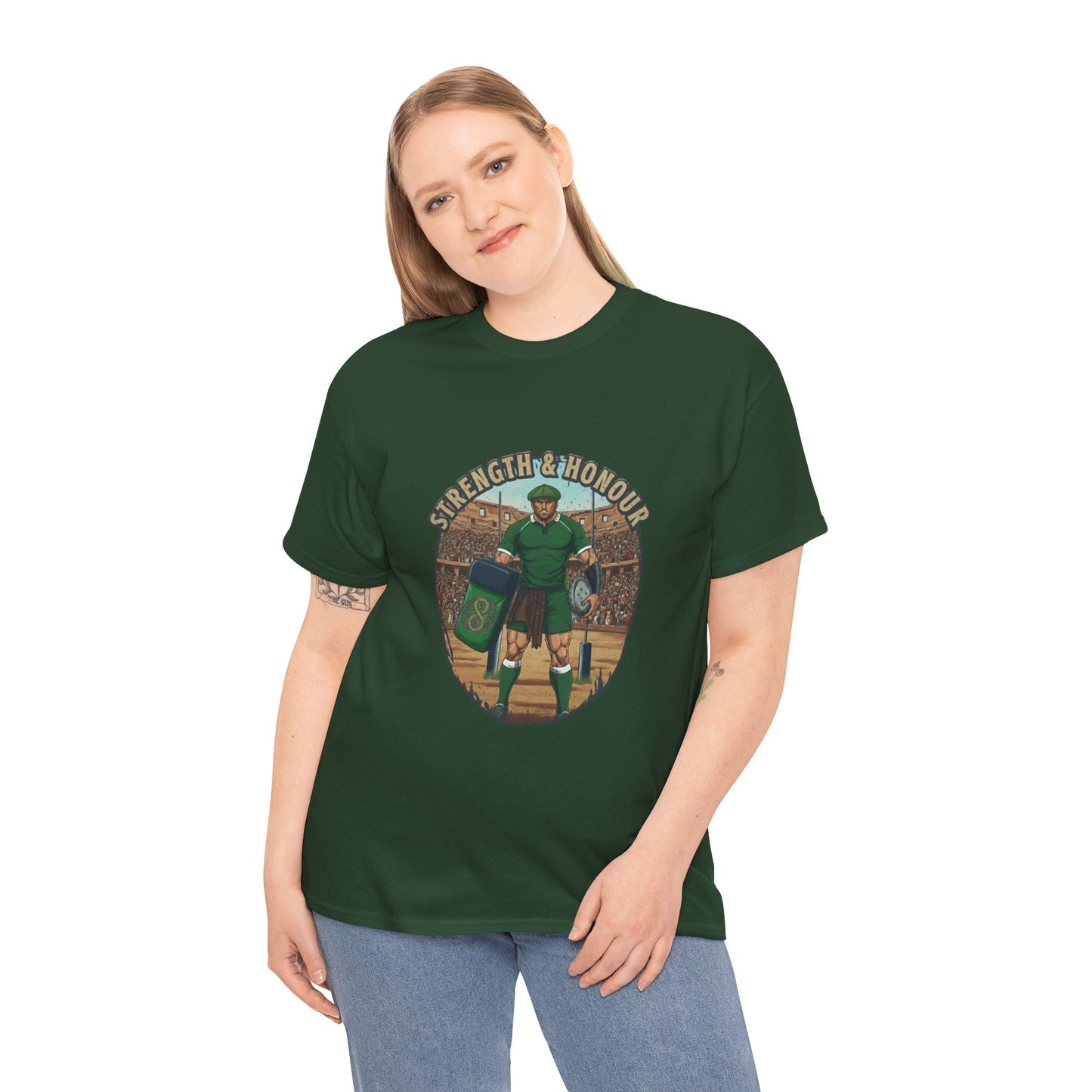 Woman wearing Green t-shirt with a graphic of a Irish rugby player with `Strength & Honour` text on a white background