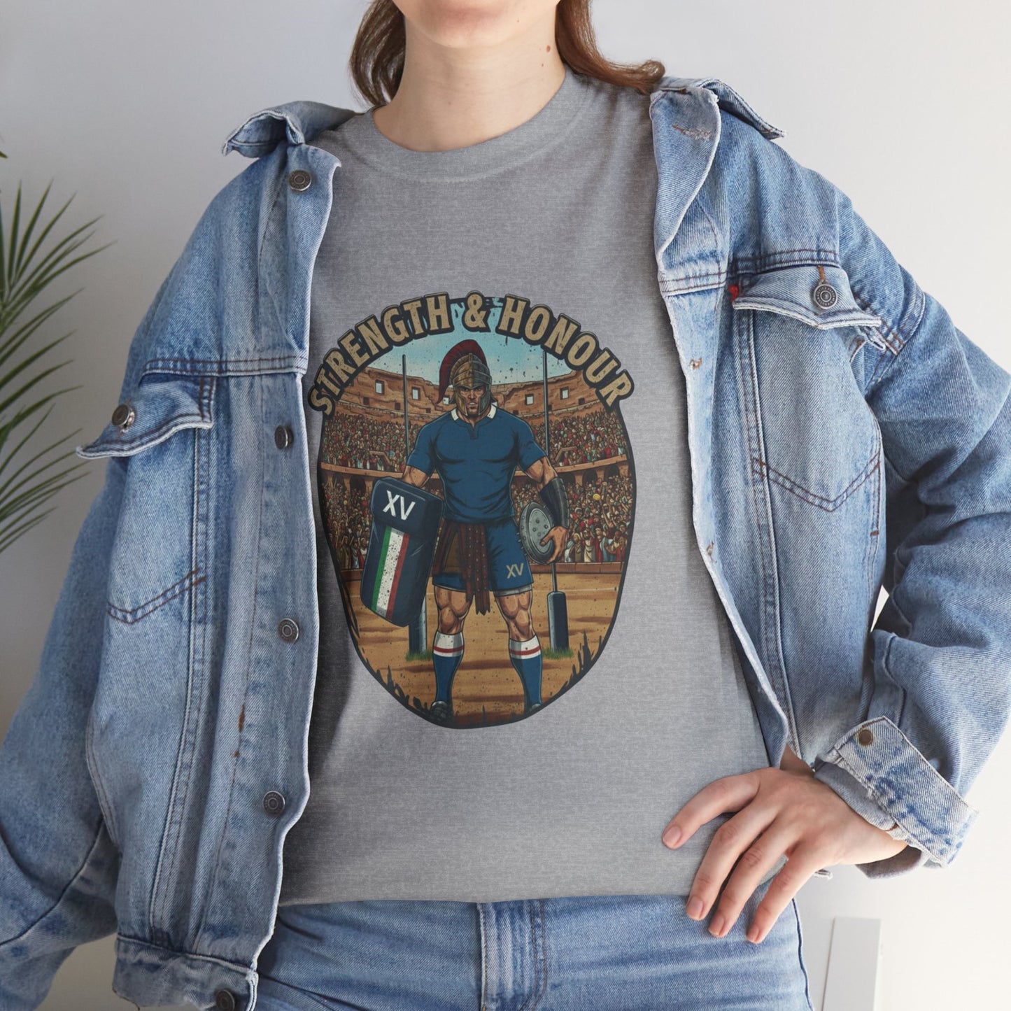Lifestyle photo of a woman wearing Light grey t-shirt with a graphic of an Italian rugby player with `Strength & Honour` text on a white background