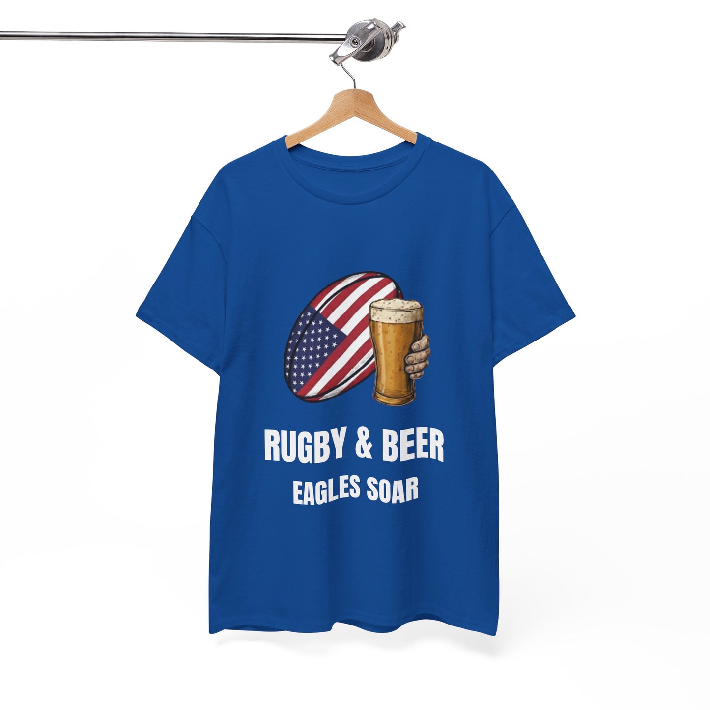 wearing Black Eagles Soar t-shirt with rugby and beer graphic and text on a white background on a hanger