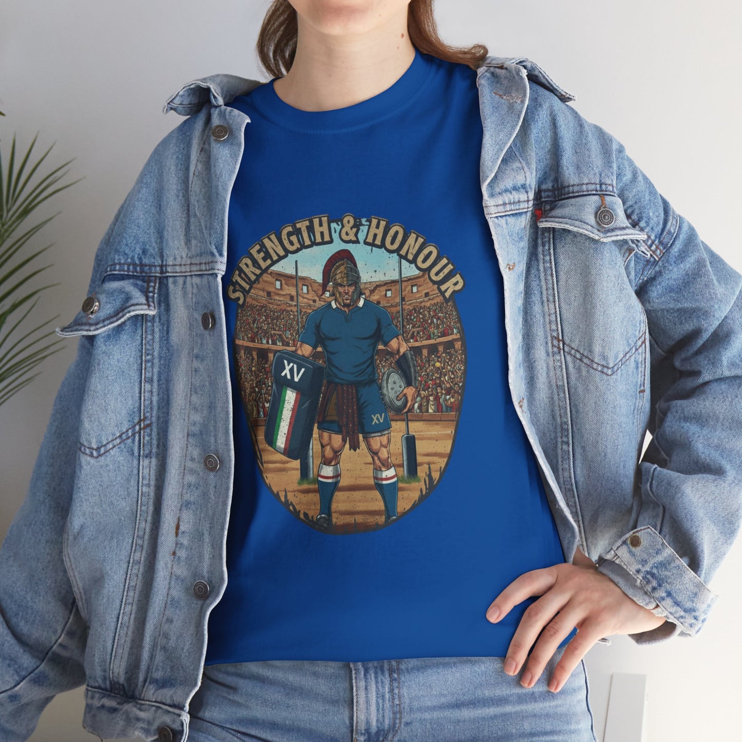 Lifestyle photo of a woman wearing Blue t-shirt with a graphic of an Italian rugby player with `Strength & Honour` text on a white background
