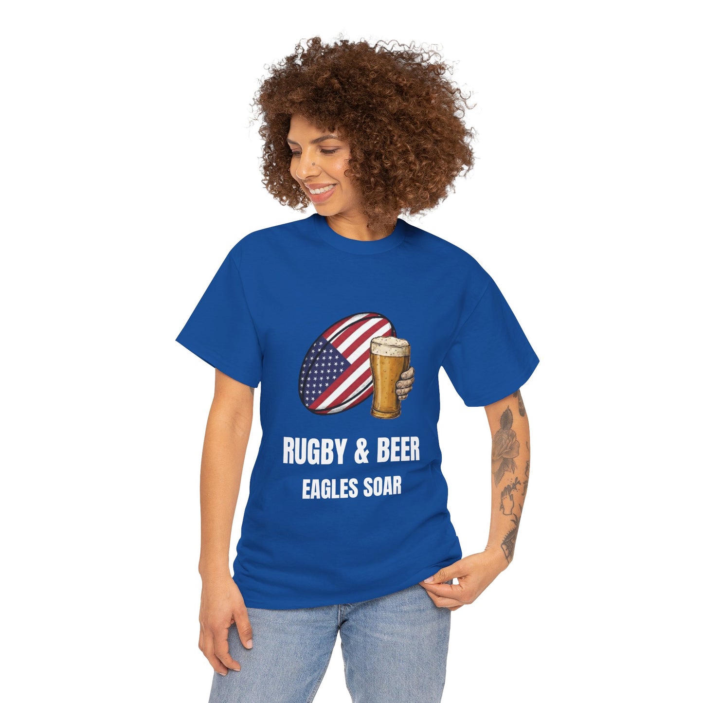 Woman wearing wearing Black Eagles Soar t-shirt with rugby and beer graphic and text on a white background