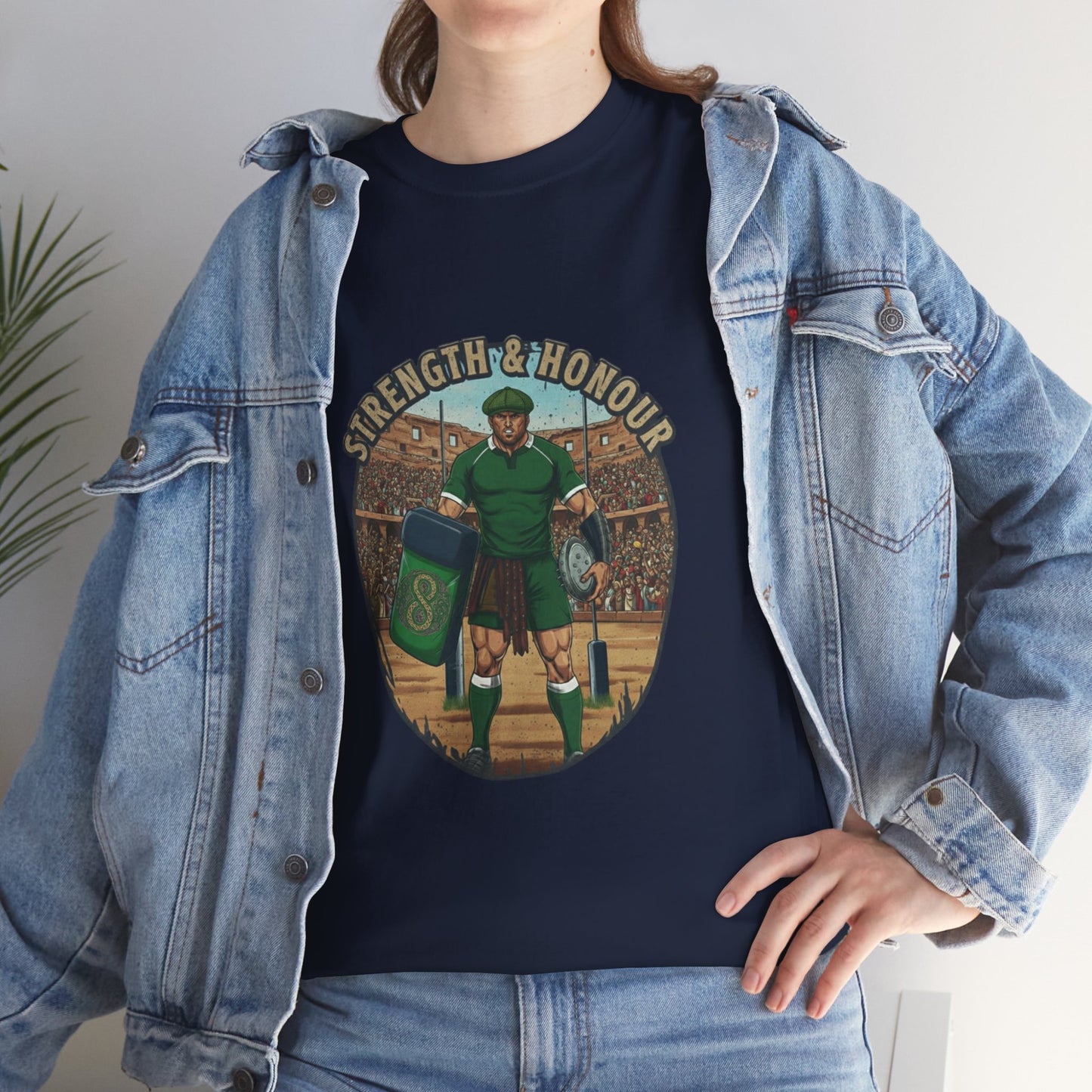 Lifestyle photo of a woman wearing Navy t-shirt with a graphic of a Irish rugby player with `Strength & Honour` text on a white background