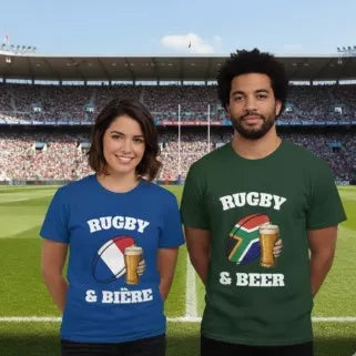 Woman wearing a French rugby t-shirt and a man wearing a South African rugby t-shirt, with rugby and beer image, standing in a stadium.