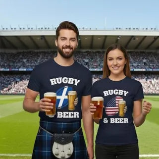 Two people wearing Scottish and American rugby and beer-themed t-shirts at a stadium.